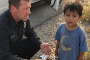A Police Officer Found a Barefoot Toddler by the Highway, Then His Grandmother Said They Had Buried Him Yesterday